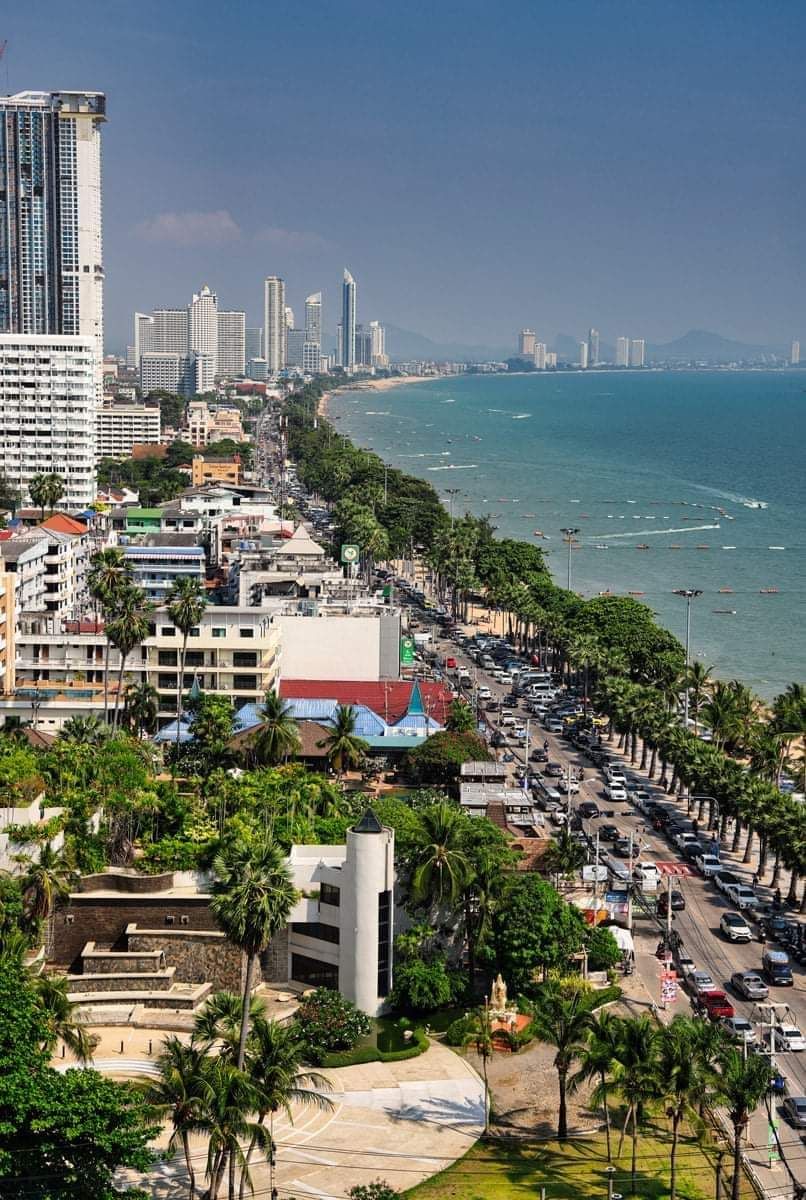 Aerial view of Central Pattaya Beach Road showing the bay, high-rise hotels, busy road and boats in the water