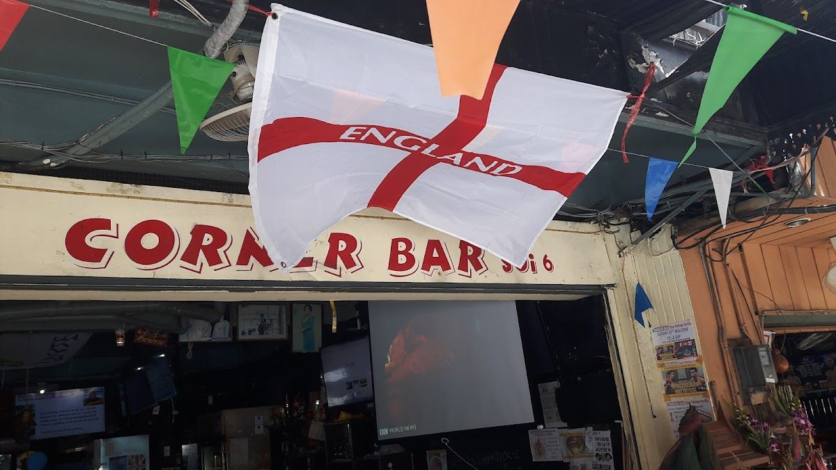 Trench Town Rasta Bar on Soi LK Metro Pattaya — neon-lit bar with customers and staff on the go-go strip off Soi Diana