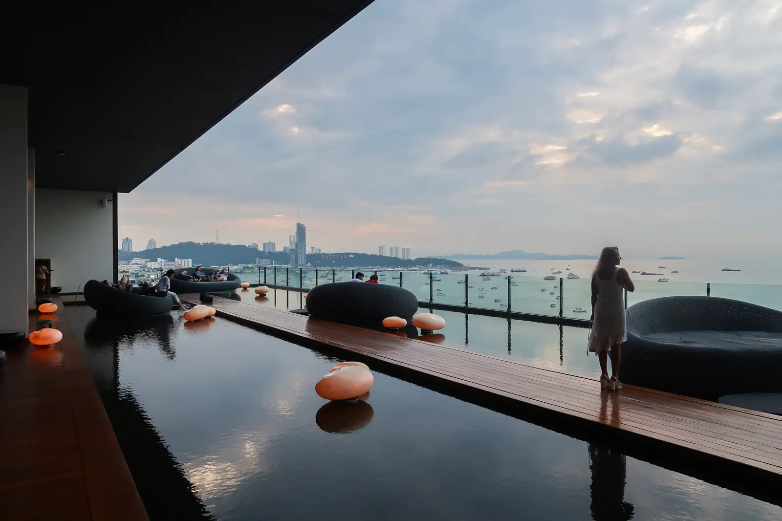The shared pool at Hilton Pattaya at dusk in 2018, not a private villa pool