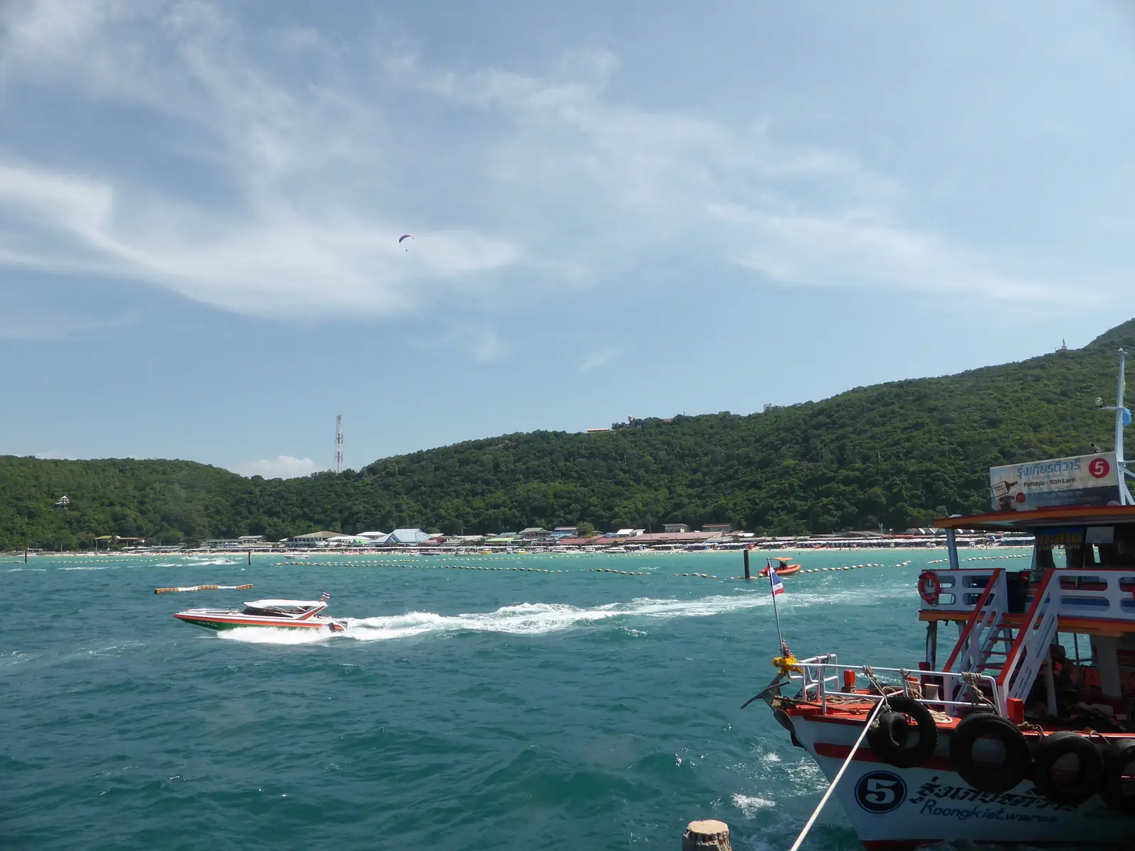 Longtail boats on the sand at Tawaen Beach, Koh Larn