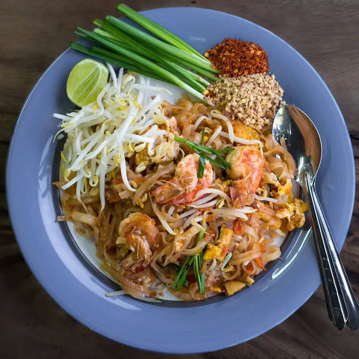 Pad thai with prawns in a takeaway box from a Thai street stall