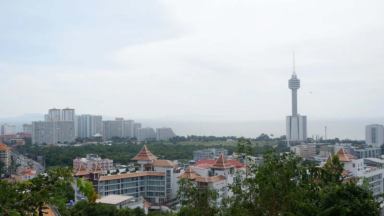 Pattaya Bay and the beachfront towers seen from the Wat Phra Yai viewpoint