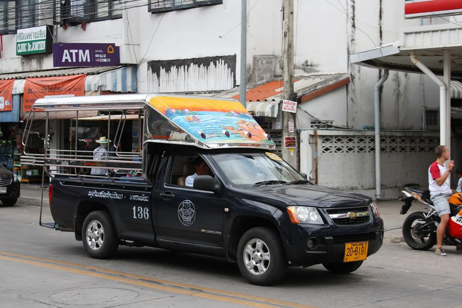 Blue songthaew trucks on a Pattaya street