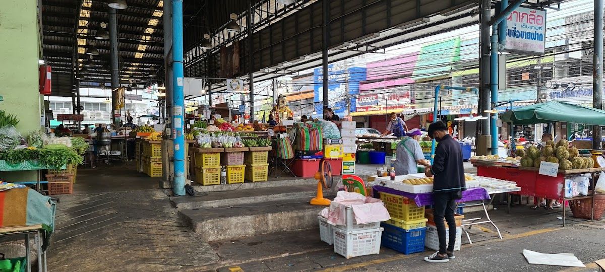Covered fresh produce stalls at Naklua Market near Wongamat Beach Pattaya