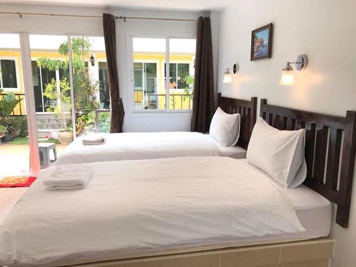 Baan Chang Residence pool and grounds in Bang Saray