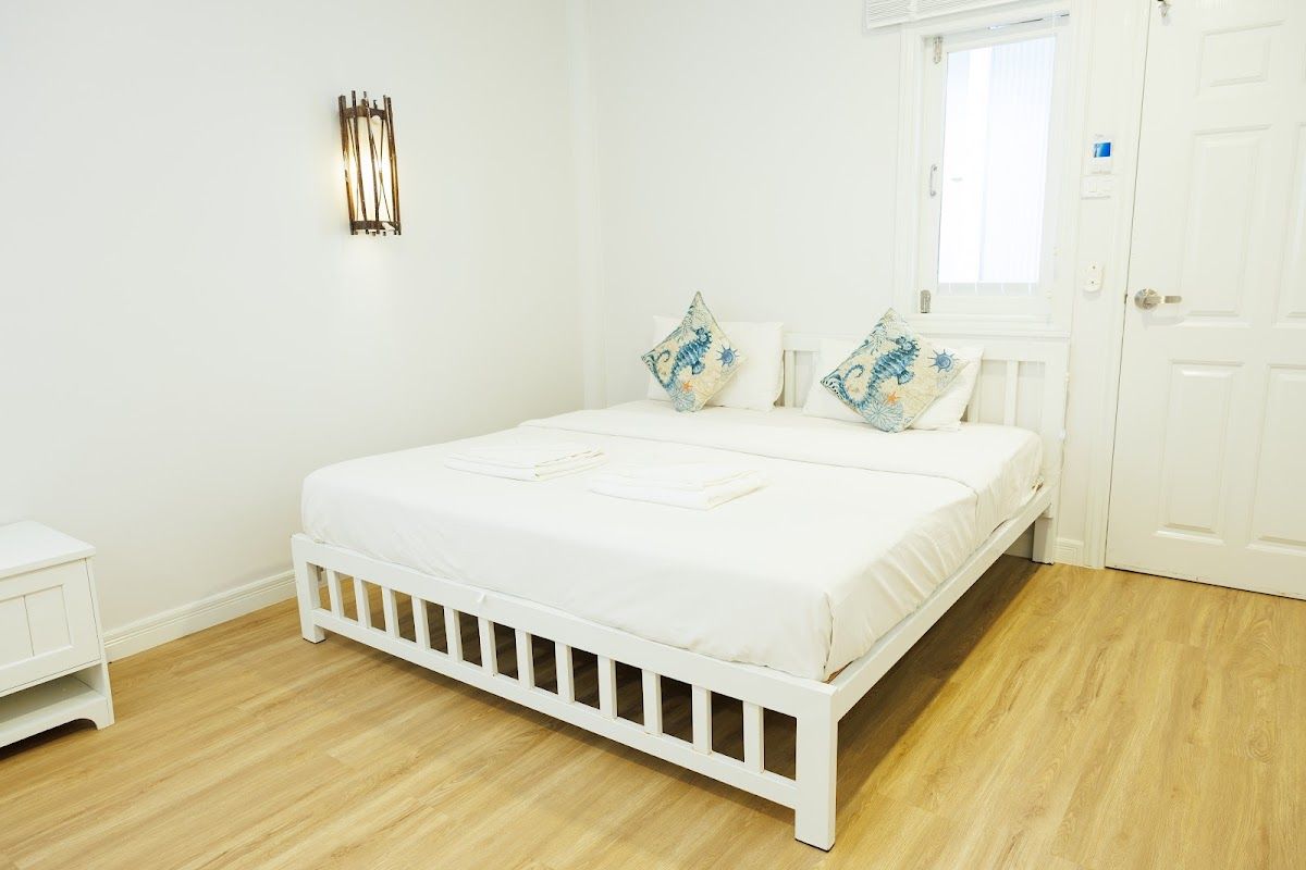 IP Plus Beach Resort pool and grounds in Naklua