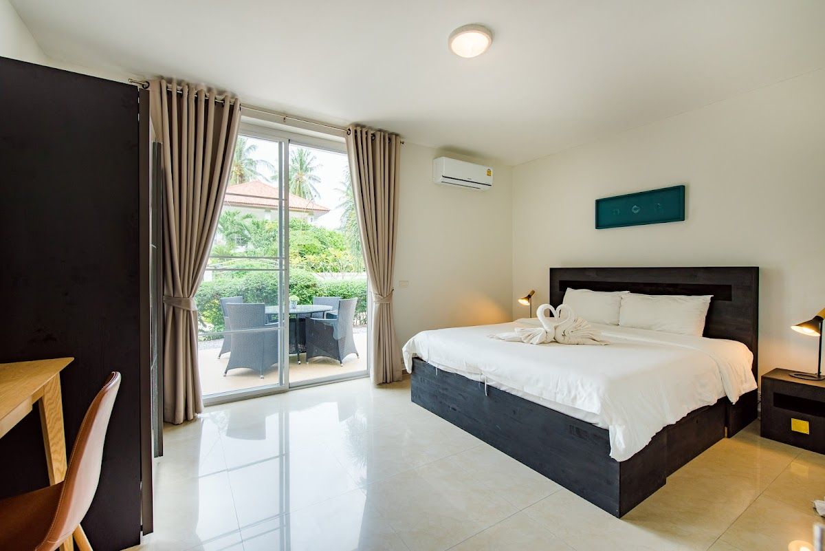 The Beach Village Resort pool and grounds in North Pattaya