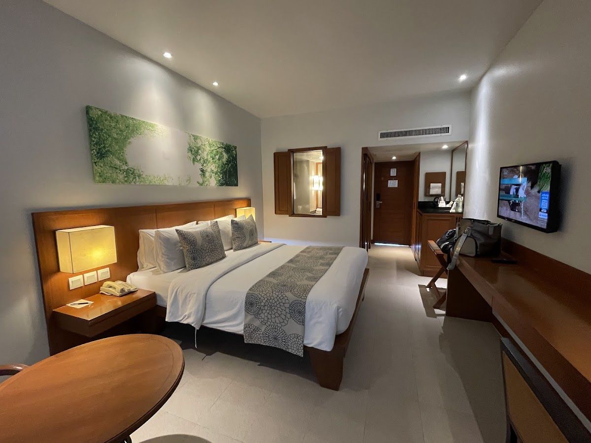 Woodlands Hotel & Resort pool and grounds in Naklua